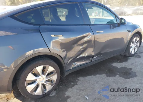 2023 Tesla Model Y Awd/Long Range Dual Motor All-Wheel Drive z USA, uszkodzony, nr VIN 7SAYGDEE4PA124374